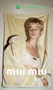 Miumiu Throw Blankets